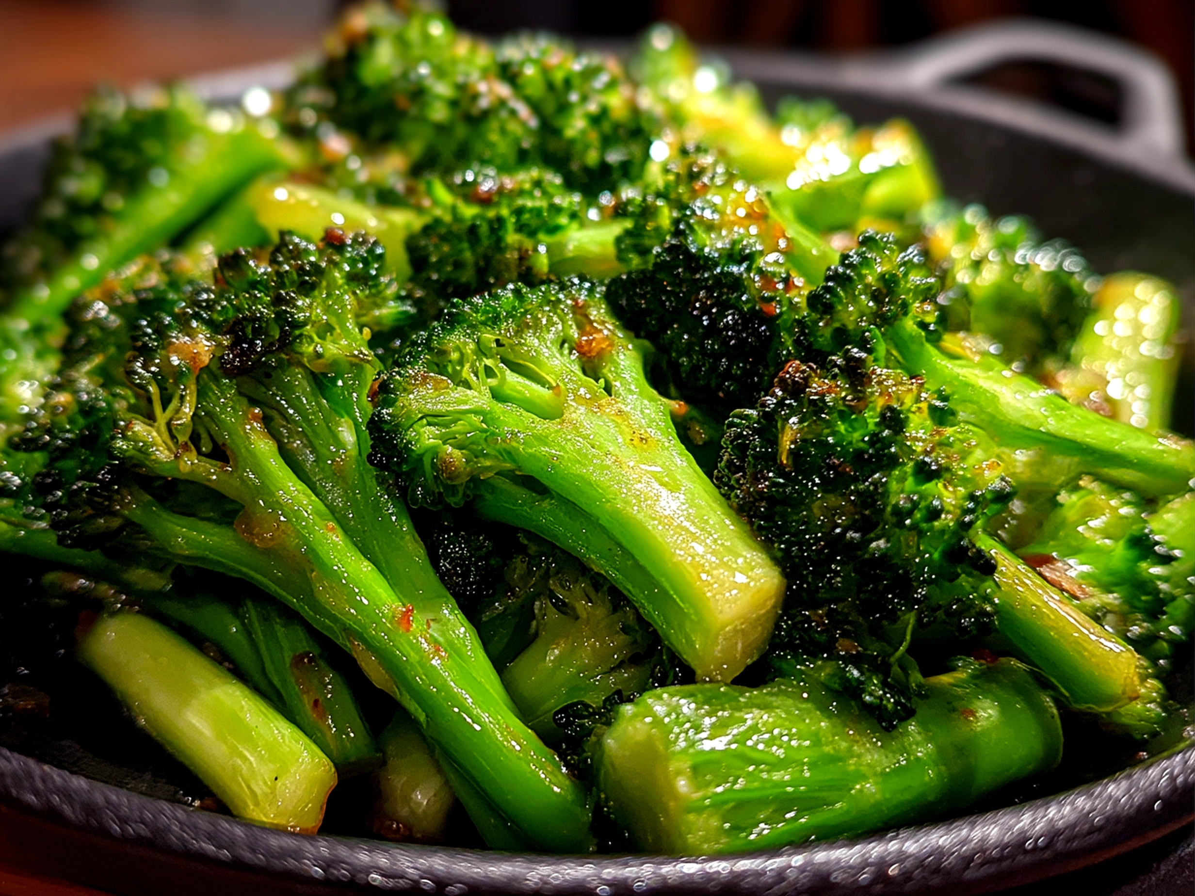 Creamy Copycat Longhorn Broccoli served in a warm bowl ready for the table