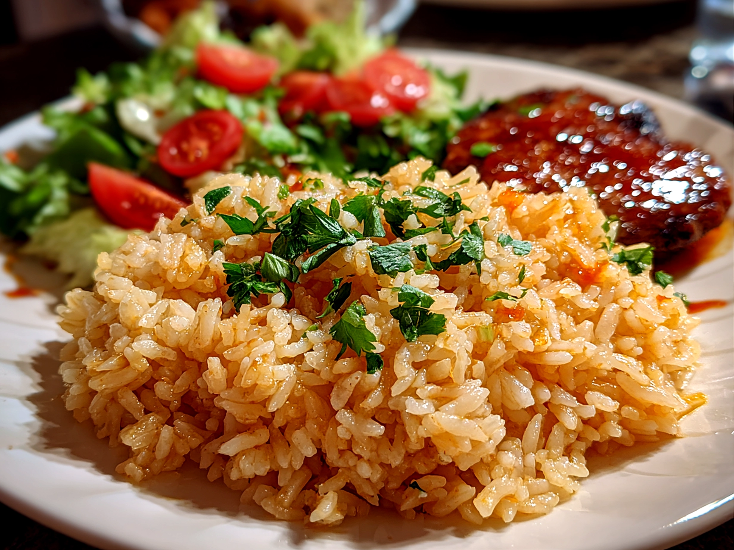 Home Cook, taken with iPhone 14 Pro. Close-up slight angle of freshly prepared Texas Roadhouse Seasoned Rice on white plate. Warm appetizing --ar 4:3 --style raw --s 270